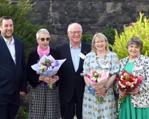 Celebrating the 75th anniversary of the Otago Rose Society yesterday are (from left) New Zealand...