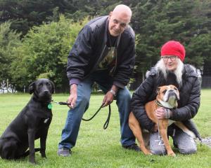 In 2022, Trev Cameron and Invercargill resident Lizzy Curry, pictured with their rescue dogs...