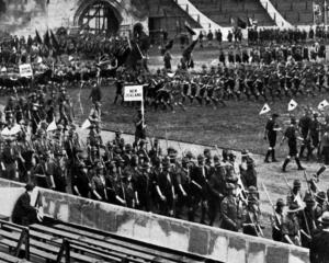 The contingent of Scouts from New Zealand enters Wembley Stadium, London for the Boy Scouts’...