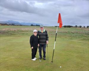 Kelvin and Betty Simkin at the Karamea Golf Club. PHOTO: GREYMOUTH STAR
