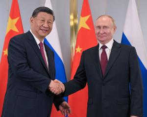 China’s President Xi Jinping and Russia’s President Vladimir Putin. PHOTO: GETTY IMAGES