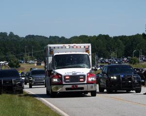 Emergency services at the scene in Winder, Georgia. Photo: Reuters