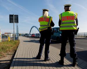 German police patrol along the German-Polish border area in Frankfurt in order to detain migrants...