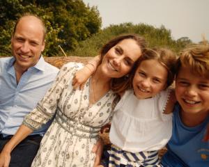 Prince William, Princess of Wales, Prince George, Princess Charlotte and Prince Louis are shown...