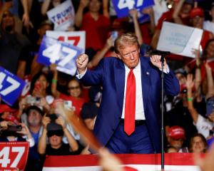 Donald Trump celebrates another successful assault on the English language. PHOTO: REUTERS