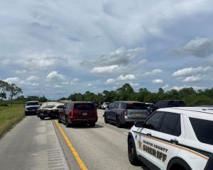 Police vehicles at the scene in West Palm Beach, Florida. Photo: Martin County Sheriff's Office...