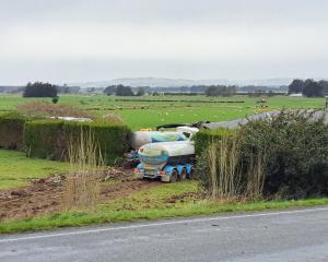 The truck crashed into a house after colliding with a car on State Highway 1 at Edendale. Photo:...