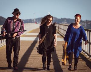 From left, Across the Great Divide’s Tony Burt, Hanna Wiskari Griffiths and Karen Jones. PHOTO:...