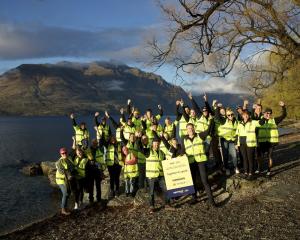 Level Group conference delegates pictured early yesterday before pitching in to do odd jobs for...