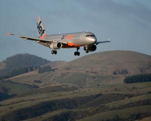 A Jetstar Airbus A320 comes in to land at Dunedin Airport. PHOTO: ODT FILES