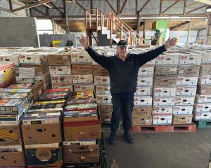 David Mead and his fellow volunteers are moving thousands of books into the Sports Hall on...