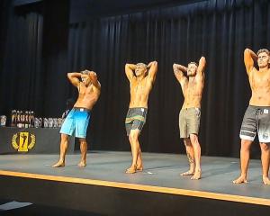 Lucas Russell (third from left) competes in the Novice Mr Body Board Shorts category, at National...