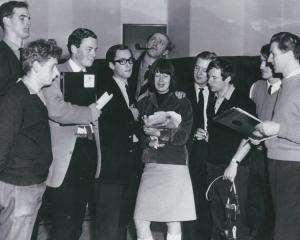 The cast of The Cambridge Circus in an NZBC radio studio during their 1964 tour. Producer Peter...