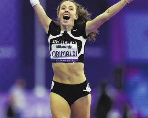 Dunedin athlete Anna Grimaldi celebrates winning the women’s T47 200m at the Paralympics in Paris...