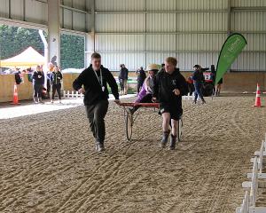 South Otago High School students Liam Wilson, 15, (left) and Finn Gilder, 17, use teamwork as...