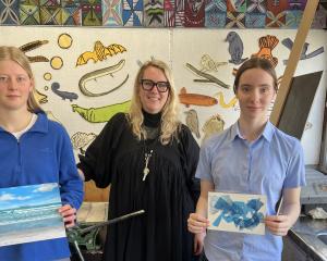 Preparing for the school’s art exhibition at the weekend are Cromwell College students Tayla...