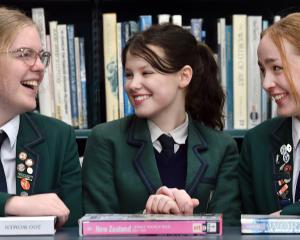 Columba College debaters (from left) Jessica Mundy, 17, Emily Roy, 15, and Clara Ballantyne, 18,...