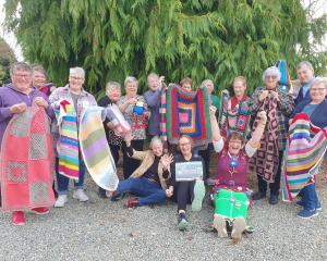 The Nattering Knitters celebrate the fundraiser. Photo: Gerrit Doppenberg