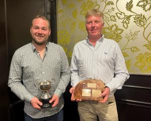 Logan McLellan (left), of Wyndham, and Simon Smith, of Kaiwera, hold the trophies they received...