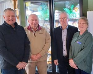 Rotary Club of Gore treasurer Graeme Lynn (left), president Russell Welsh (second from left) and...