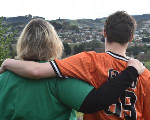 A foster mother and her son, who has foetal alcohol spectrum disorder, on its awareness day...