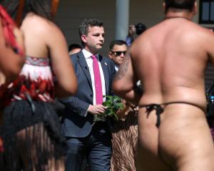 Act New Zealand leader David Seymour accepts a wero (challenge) at Te Whare Runanga during a...