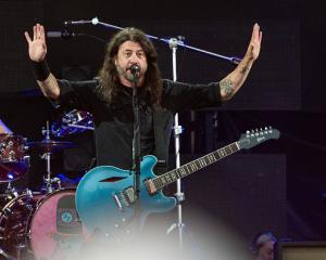 Dave Grohl on stage at the Roskilde Festival in Denmark earlier this year. Photo: Getty Images