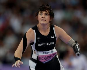 Dunedin’s Holly Robinson anxiously follows the flight of her javelin in the women’s competition...