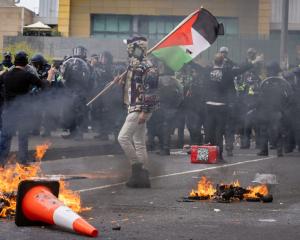 Anti-war protesters are vowing to defy police and rally again outside a Melbourne weapons expo....