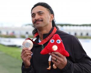 Peter Cowan poses with his bronze medal in Paris. Photo: Getty Images