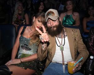 Taylor Swift and Post Malone attend the 2024 MTV Video Music Awards at UBS Arena on September 11,...