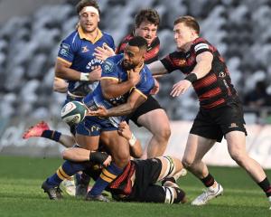 Otago winger Jona Nareki flicks the ball in today's NPC match against Canterbury at Forsyth Barr...