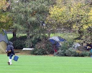 Homeless people’s tents pictured on the Oval in May are gone for now but charities say they could...