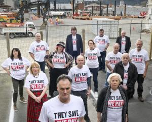 Dunedin Mayor Jules Radich and his councillors appeared in a photo shoot to express their concern...