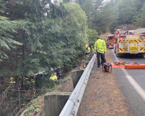 Emergency services at the scene of the crash. Photo: Stephen Jaquiery