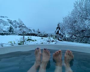 Enjoying the snow at Lake Hayes. Photo: Janie Reese