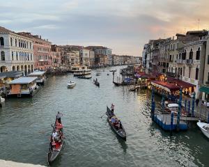 Looking down on the Grand Canal from the Rialto Bridge. 