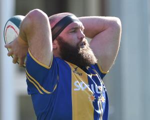 Veteran Otago hooker Liam Coltman prepares to throw the ball in during a training session at...