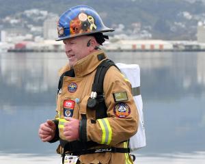 Frankton volunteer firefighter Jamie Harris runs the Emerson’s Dunedin Half-marathon in full...