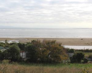 A view of the beach at Omaui. The settlement's Mokomoko Road Reserve is owned by the Invercargill...