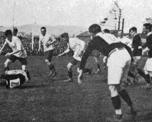 Warwick (Wellington) and Pennycook (Otago) contest the ball in a Wellington v Otago rugby match...