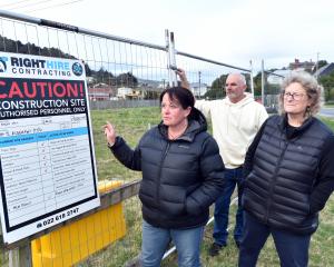 West Harbour residents (from left) Kristina Goldsmith, Jarrod Hodson and Ange McErlane are upset...