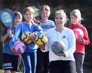 Enjoying their new sports equipment are Port Chalmers School pupils (from left) Paxton More, 11,...