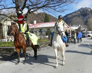 Queenstown riders Kate Pirovano (left), on Jimmy, and Kaye Eden, on Banjo, ride in Arrowtown’s...