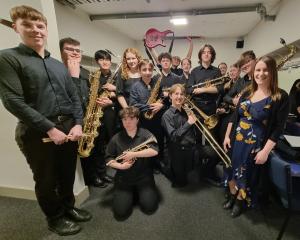 Southland Youth Jazz Band celebrate their success after their winning performance at the Southern...