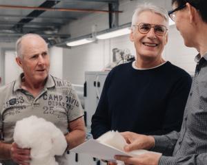 Inspecting woollen air filters in a Blueair laboratory in Stockholm are (from left) Ovis Global...