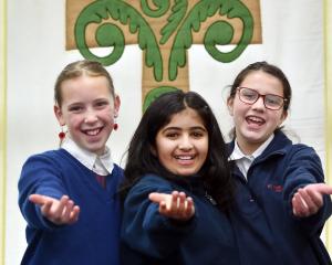 St Mary’s Kaikorai School pupils (from left) Ngaika Rapsey, Olivia Reju and Alyssa Kubala sing...