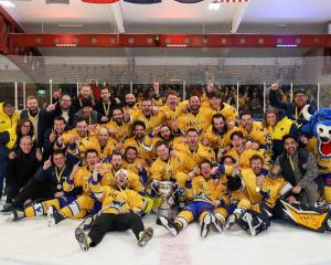 Stampede players and staff celebrate victory in the New Zealand Ice Hockey League finals in...