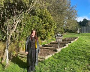 Rotary Dunedin Central president April Eden stands by the raised garden beds at Bradford School,...