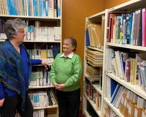 NZ Society of Genealogists Dunedin branch 55th birthday celebration convener Robyn Thorburn (left...